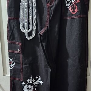 Black Wide Leg Pants with Red Stitching and White Skull Accents